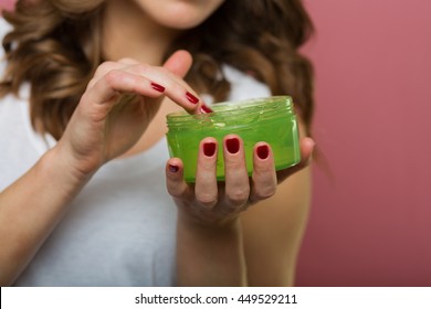 Beautiful Woman Holding An Aloe Vera Gel Bottle