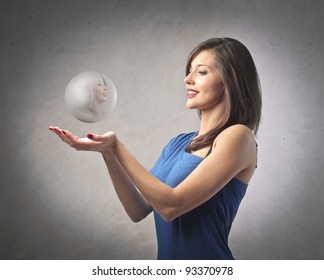 Beautiful Woman Holding A Crystal Ball
