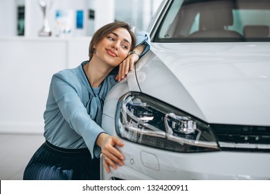 Beautiful Woman Hugging A Car