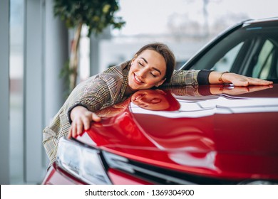 Beautiful Woman Hugging A Car