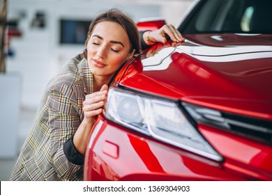 Beautiful Woman Hugging A Car