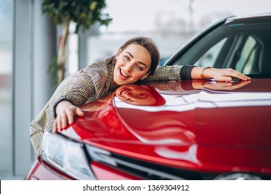 Beautiful Woman Hugging A Car