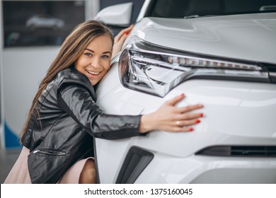 Beautiful Woman Hugging A Car