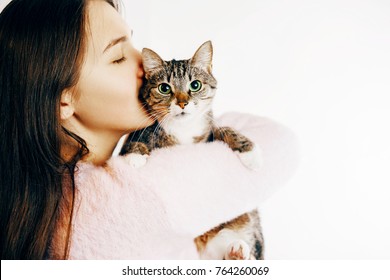 Beautiful Woman Kisses And Hugs Cat