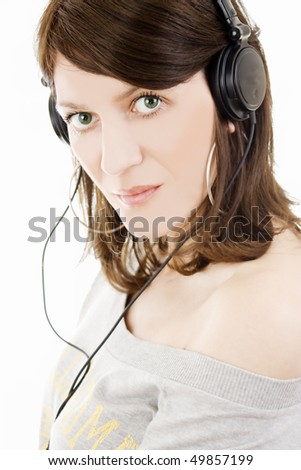 Similar – Young blonde woman listening to music with her headphones