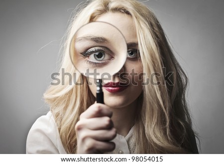 Similar – Image, Stock Photo Blonde woman looks through a window pane with reflections directly into the camera