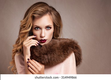 Beautiful Woman In Luxury Fur Coat