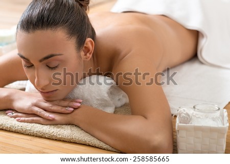 Beautiful Woman Lying on a Massage Table