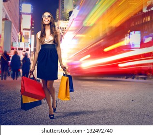 Beautiful Woman With Many Shopping Bags