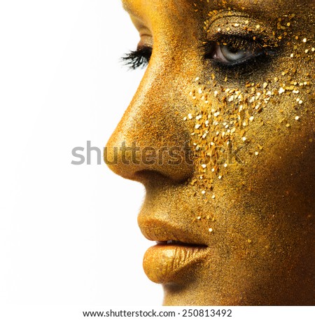beautiful woman model with professional makeup, golden face