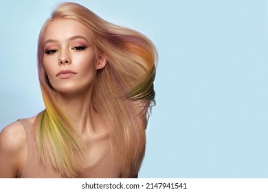 Beautiful woman and multi  colored hair   classic make up   hairstyle  Beauty face 