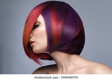 Beautiful woman and multi  colored hair   creative make up   hairstyle  Beauty face 