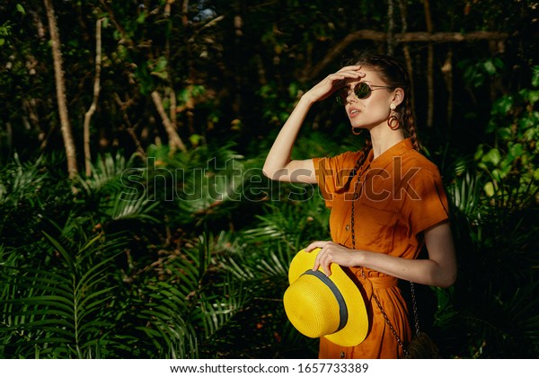 Beautiful woman nature tropics jungle island travel\
fresh air of sun