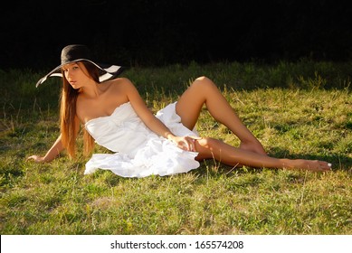 Beautiful woman on the grass 