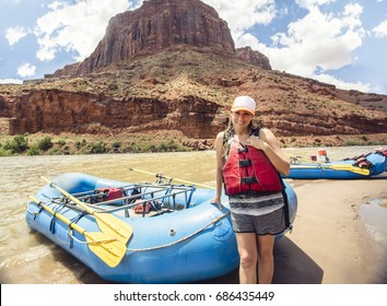 Beautiful Woman On A Rafting Trip Down The Colorado River