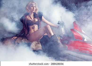 Beautiful Woman On Snowmobile 