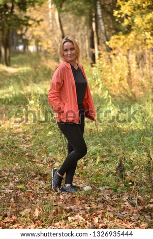 Similar – Porträt einer jungen Frau geht als Training nach draußen.