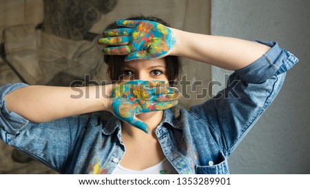 Beautiful woman with painted hands