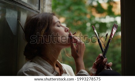 Similar – Image, Stock Photo smoke Young woman portrait