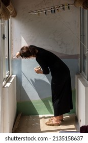 Beautiful Woman Painting A Mural Inside Her House In Buenos Aires