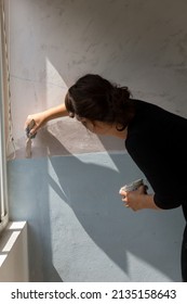 Beautiful Woman Painting A Mural Inside Her House In Buenos Aires