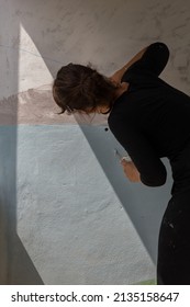 Beautiful Woman Painting A Mural Inside Her House In Buenos Aires