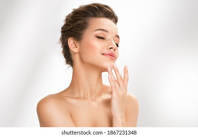 Beautiful Woman With Perfect Makeup On White Background. Beauty And Skin Care Concept