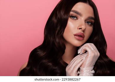 Beautiful woman with perfect skin on pink background. Beauty and skin care concept. - Shutterstock ID 2293882267