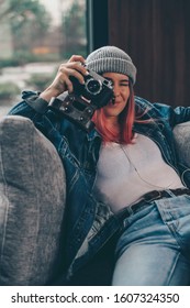 beautiful woman with pink hair portrait photographer. non-binary