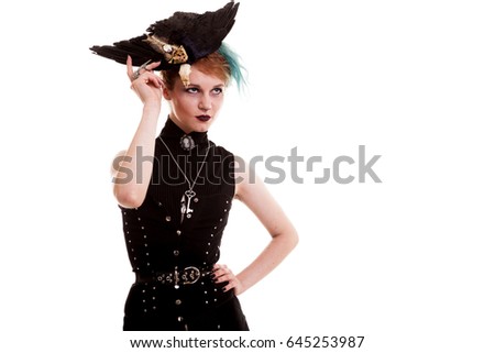 Beautiful woman in pirate costume isolated over white background in studio photo. Carnival and halloween. Fantasy and masquerade