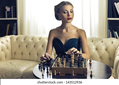 Beautiful Woman Playing Chess