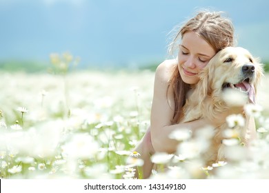 Beautiful Woman Playing With Her ??dog. Outdoor Portrait. Series