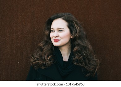 Beautiful Woman Portrait. Social Media Profile Picture. 20-29 Years Old Female Portrait. Long Curly Hair Brunette Girl.