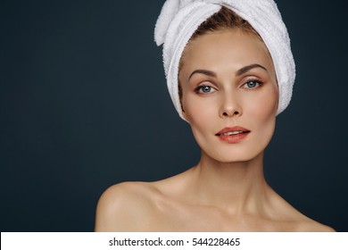 Beautiful Woman Portrait In Spa Bath Towel Turban.