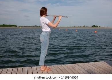 Beautiful Woman Posing Beach While Playing Stock Photo