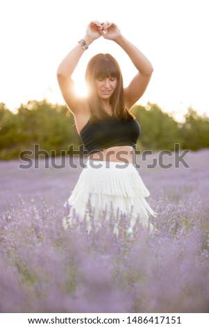 Similar – Young woman doing yoga in nature