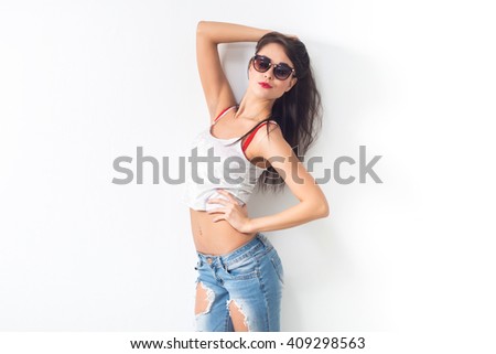 Similar – Woman with sunglasses looking at camera over garden fence