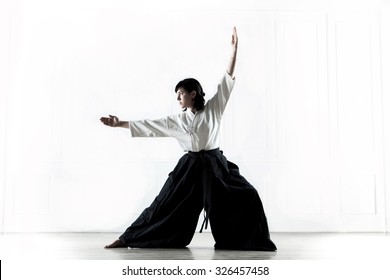 beautiful woman practicing Aikido