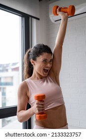 Beautiful Woman Practicing Yoga At Home, Trying To Get In Shape After Child Birth. Fitness Routines After 40