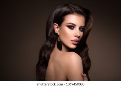 Beautiful Woman With Professional Make Up And Hairstyle