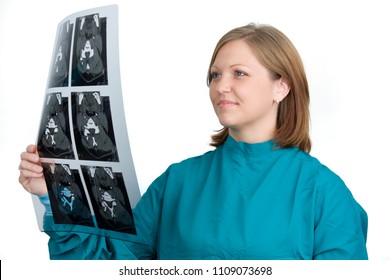 Beautiful Woman Radiologist Reading X-Ray On White Background