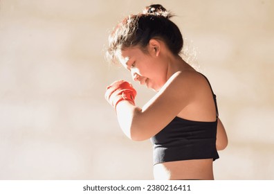 Beautiful Woman with the Red Boxing Gloves. Attractive Female Boxer Training. - Powered by Shutterstock