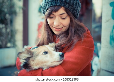 Beautiful Woman Red Coat Winter Hugging The Dog