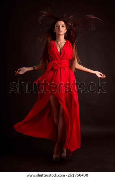 red flowing gown