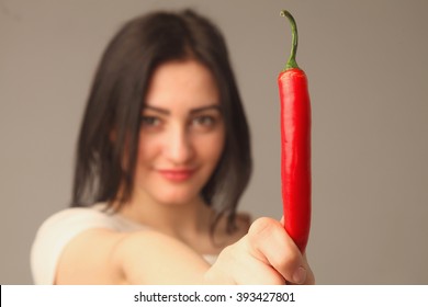 Beautiful Woman  With Red Hot Chili Pepper