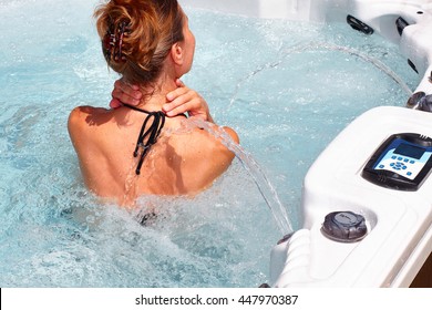 Beautiful Woman Relaxing In Hot Tub.