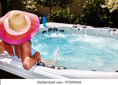 Beautiful Woman Relaxing In Hot Tub.