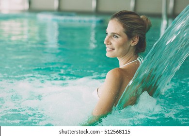 Beautiful Woman In Resort Spa  Swimming Pool