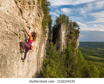 Beautiful Woman Rock Climbing In Ontario, Canada.