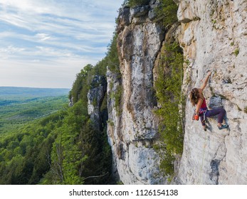 Beautiful Woman Rock Climbing In Ontario, Canada.